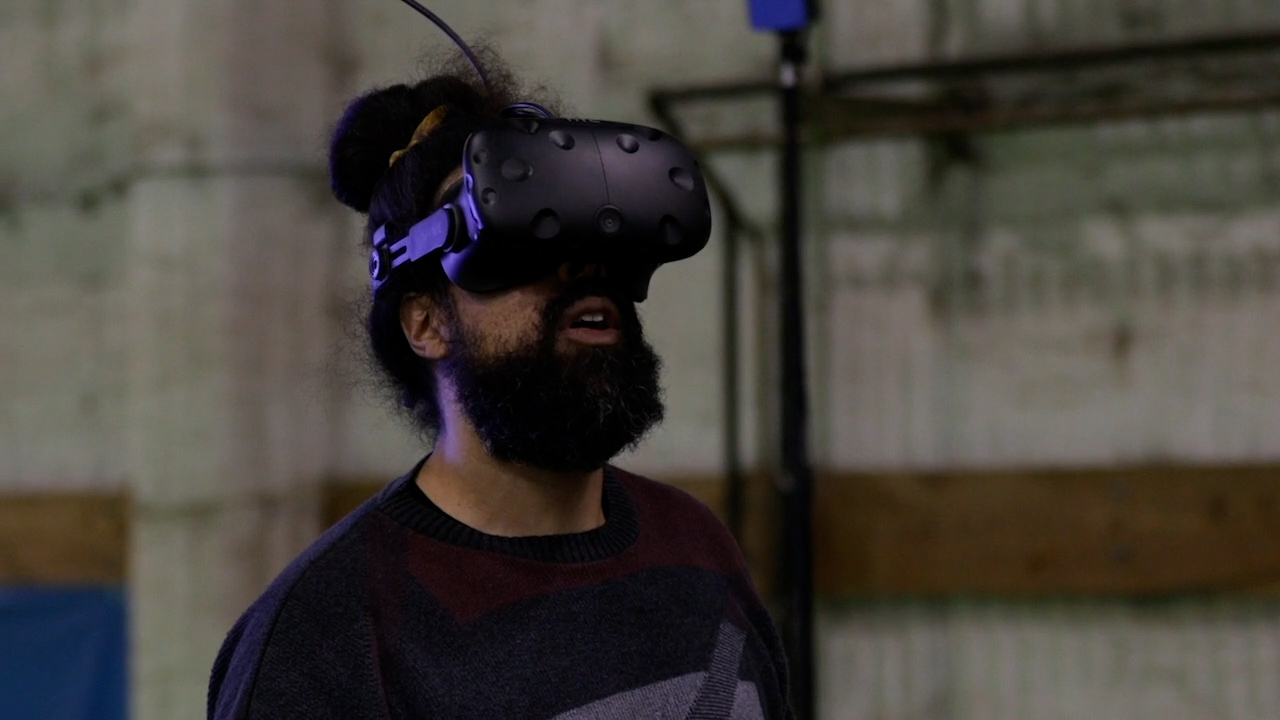 reggie watts in vr goggles